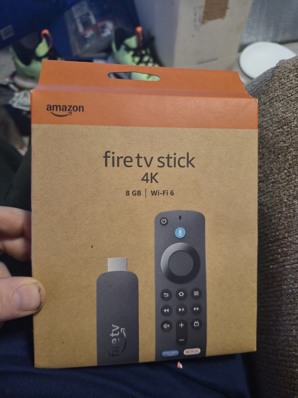 Amazon 4K Streaming Stick in Black with Orange Accent Box